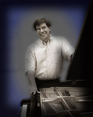 Doug Davis by the piano